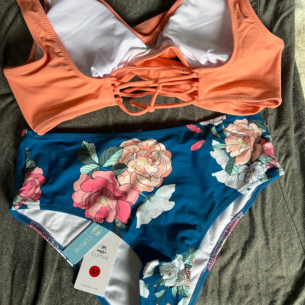 Medium - floral lace bikini with high waisted bottoms.
